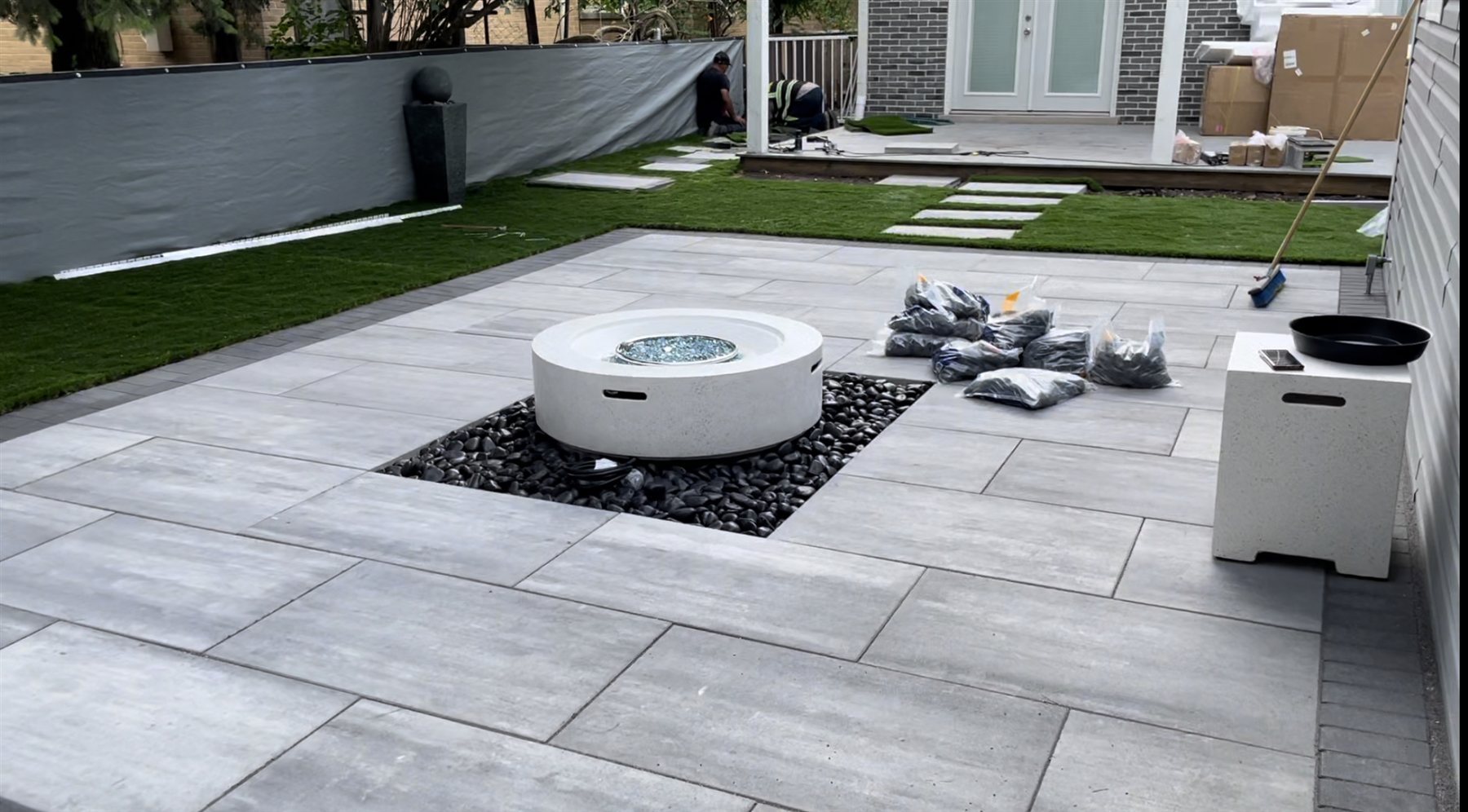 Paver patio, stepping stones and lawn during an outdoor project